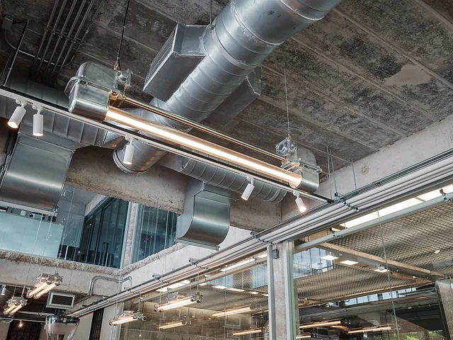 Exposed exhaust and ventilation ductwork inside a building
