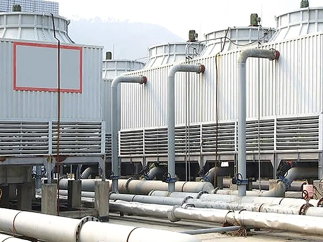 Cooling tower cells and connected condenser-water pipework