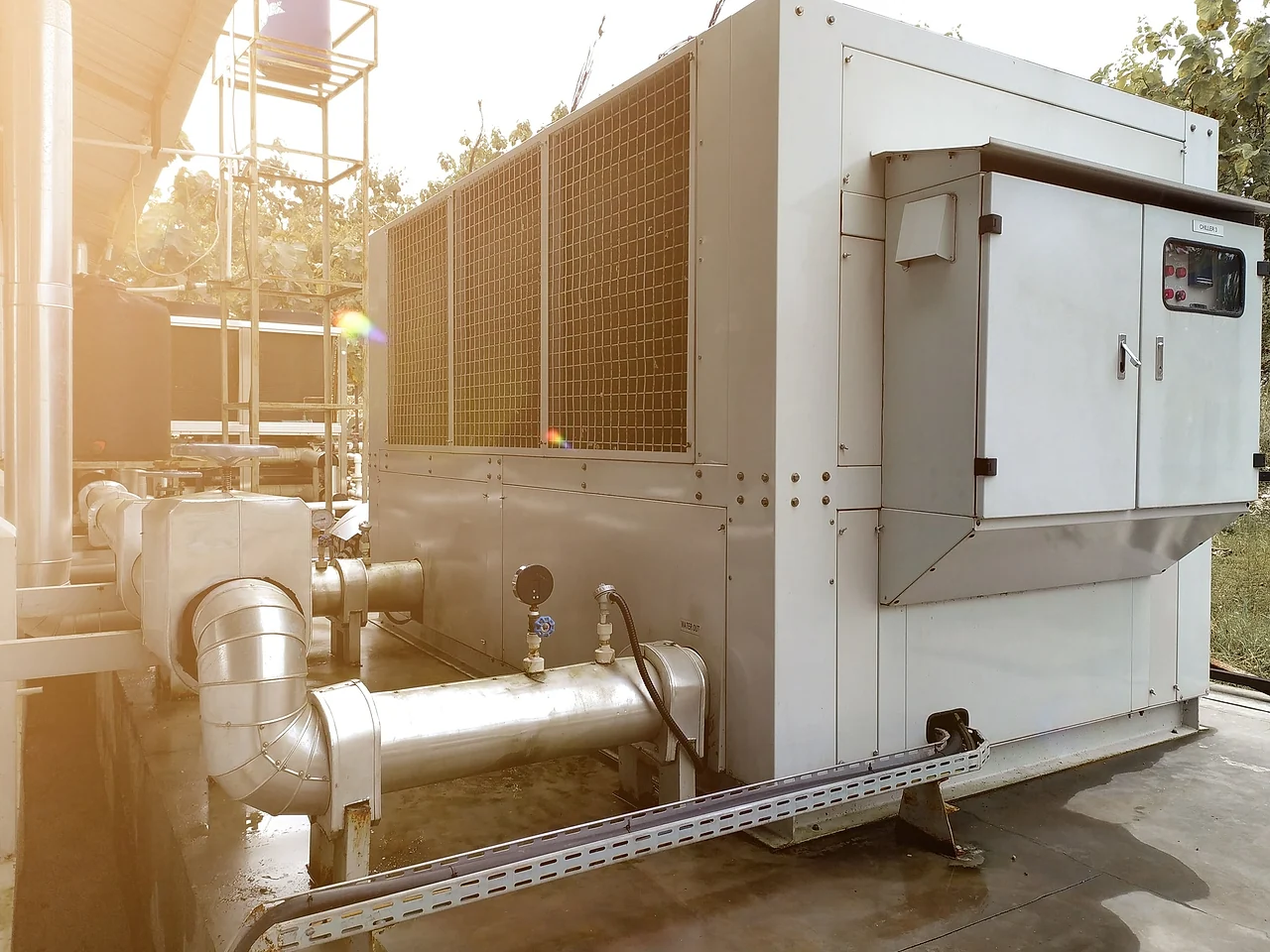 Packaged water-cooling equipment and pipework at an industrial facility