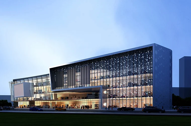 Modern commercial complex illuminated at dusk