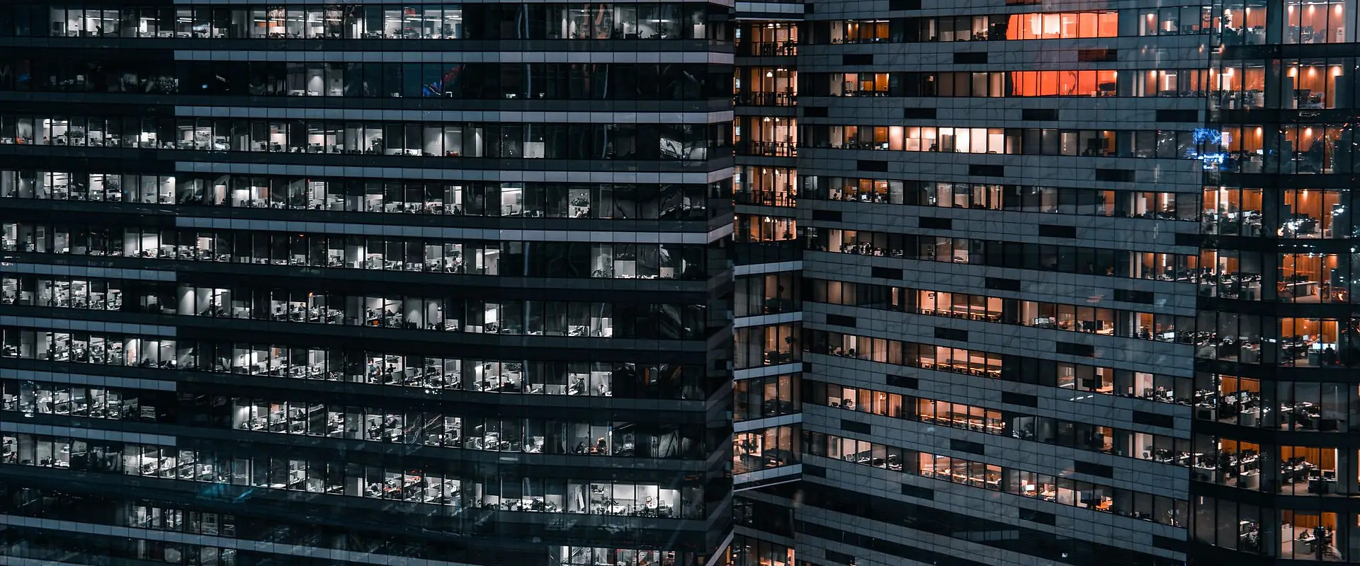 Commercial office towers lit up at night